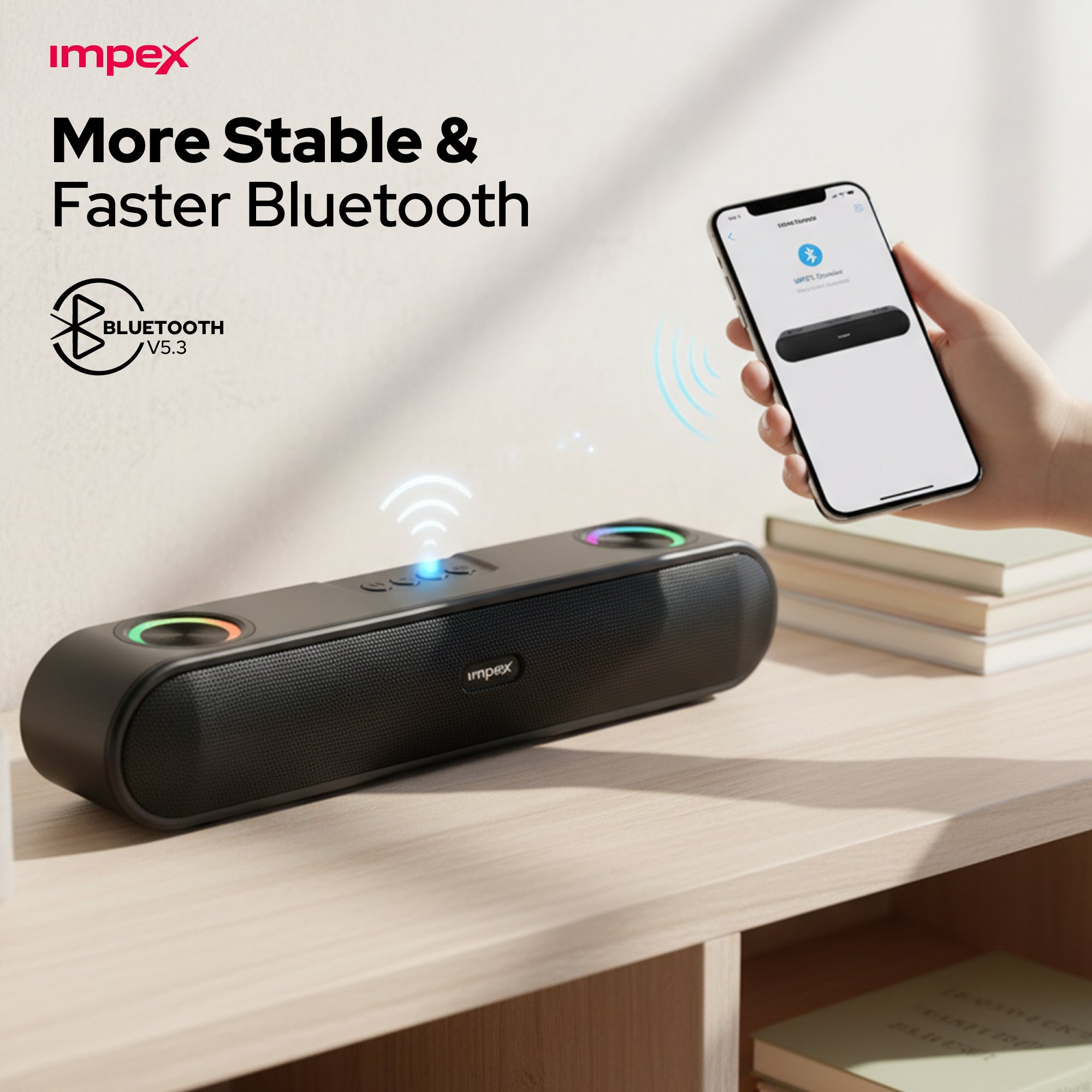 Impex Bluetooth speaker on a desk with a smartphone showing Bluetooth connection.
